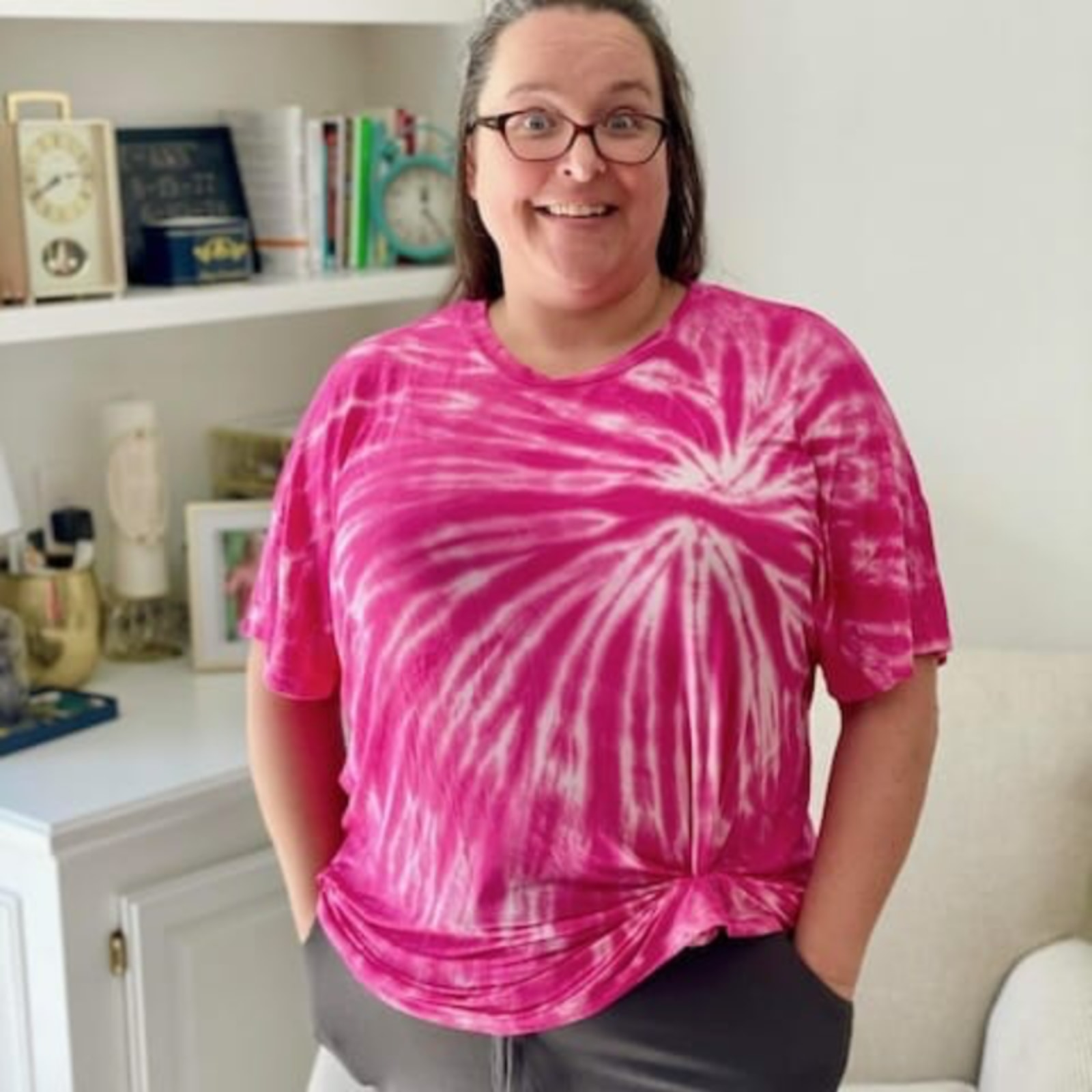 Sarah wearing a pink tie dye t-shirt.